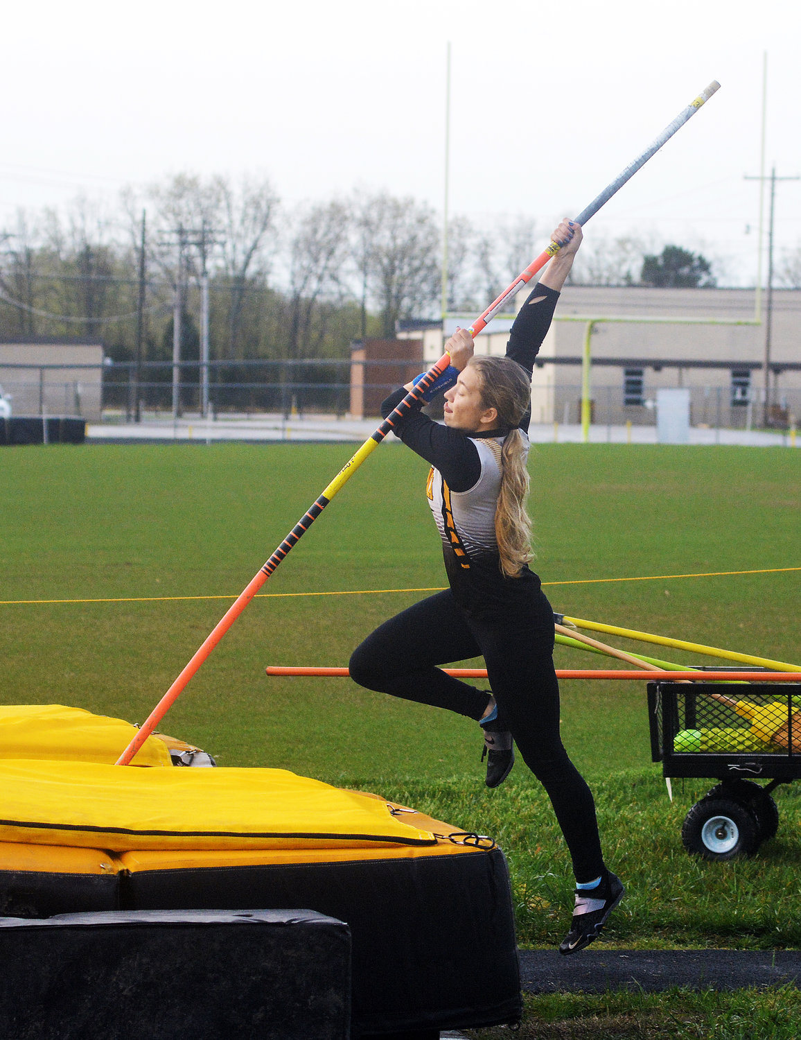 Riley Rosentreter warms up for the varsity girls pole vault which was held at Cuba High School prior to the rest of the GVC track meet in Bourbon.
